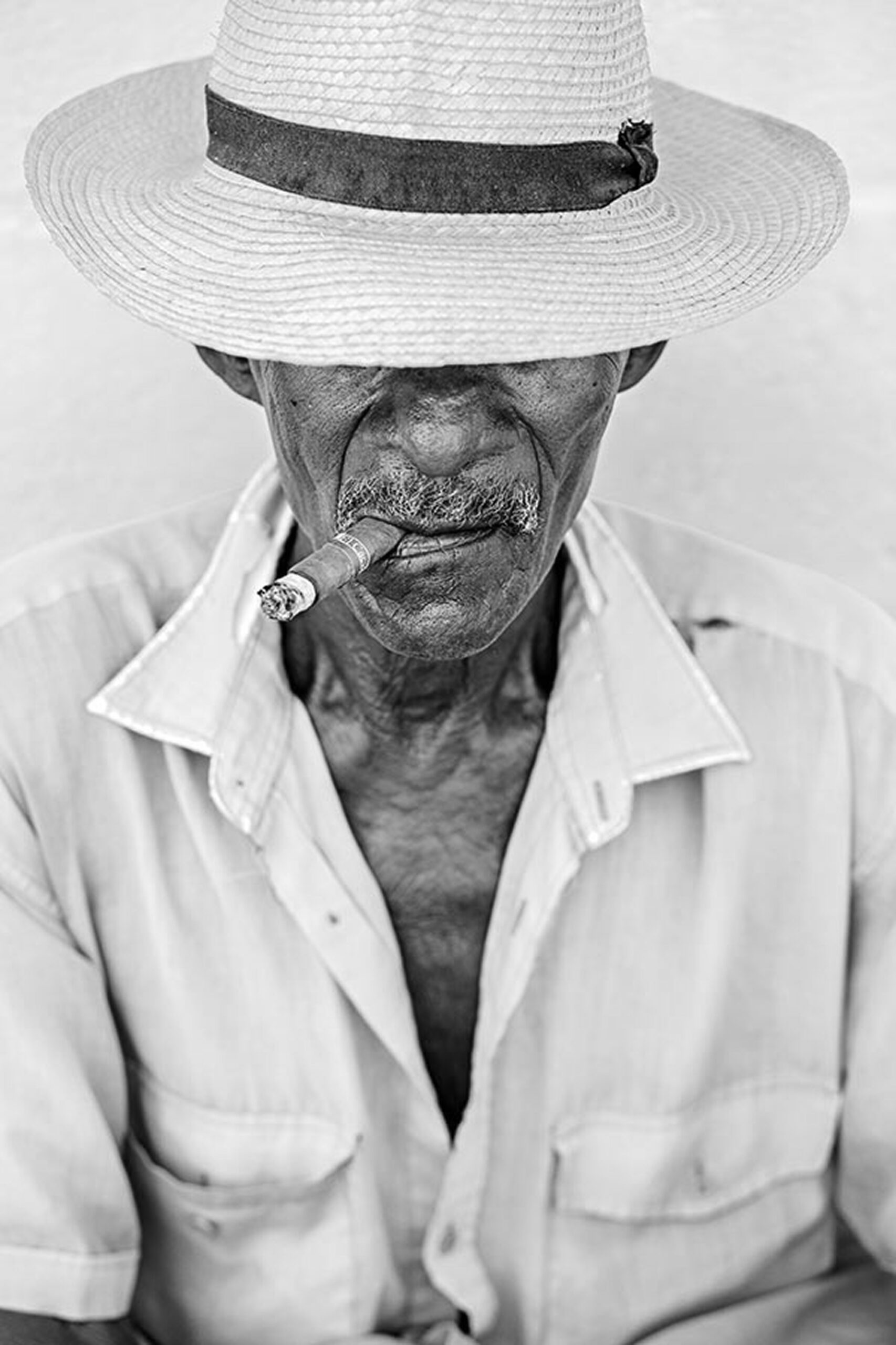 Cuban Master enjoying cigar